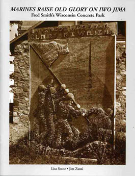 Concrete relief sculpture of a figure on a stone wall