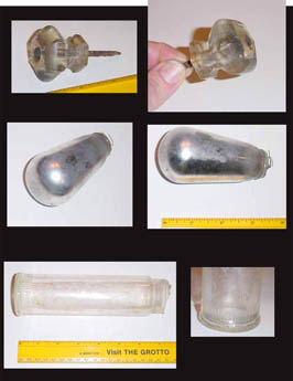 Multiple views of glass doorknobs and a clear glass tube with rulers