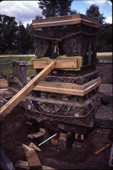 Multi-tiered building of stacked blocks and wood with a diagonal beam