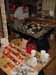 A blurry interior room with a table holding a patterned cloth and small objects